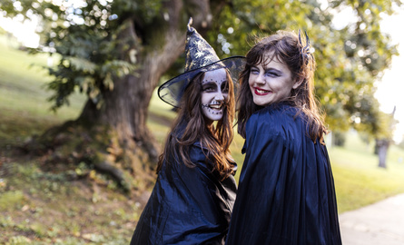 Portrait of two masquerade girls at Halloween